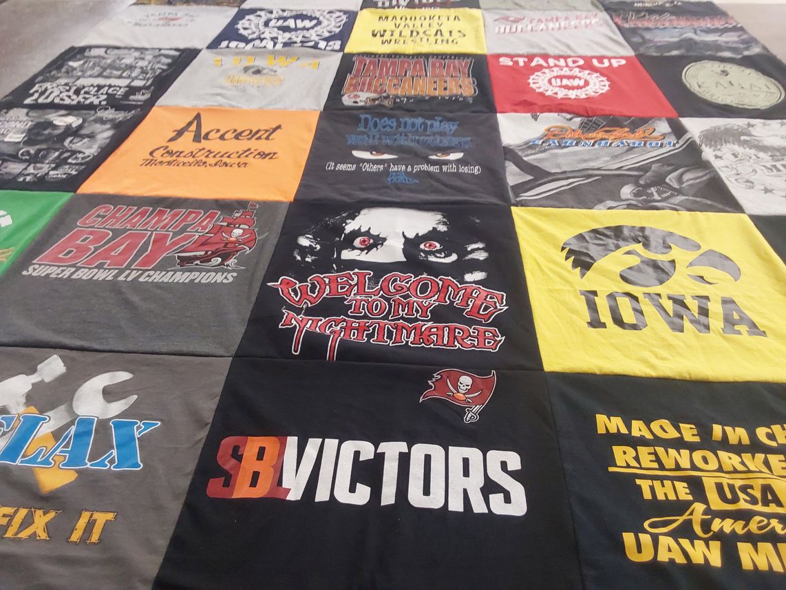 T-shirt quilt featuring tampa bay buccaneers, iowa hawkeyes by Deb from IA