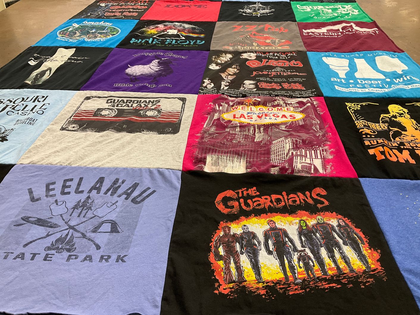 T-shirt quilt with music, travel themes by Christy from MI