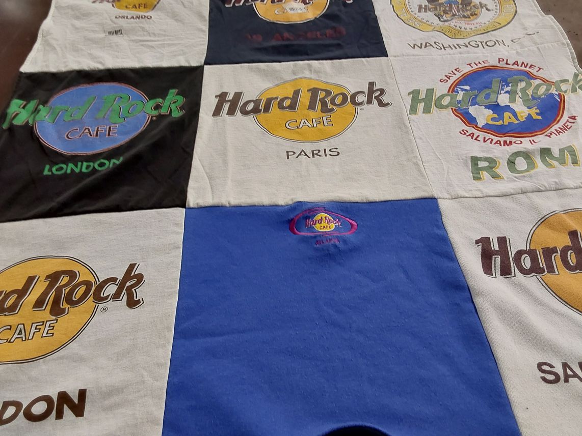 T-shirt quilt with music, travel themes by Melanie from CO