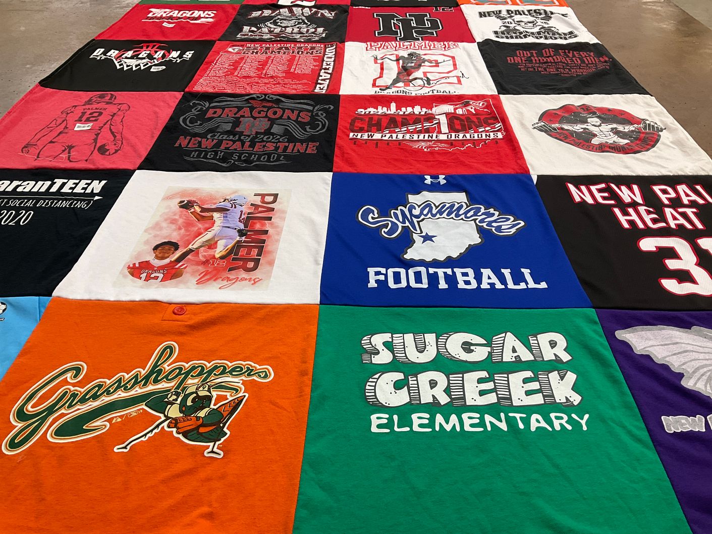 T-shirt quilt featuring dragons, sycamore football by Maureen from IN