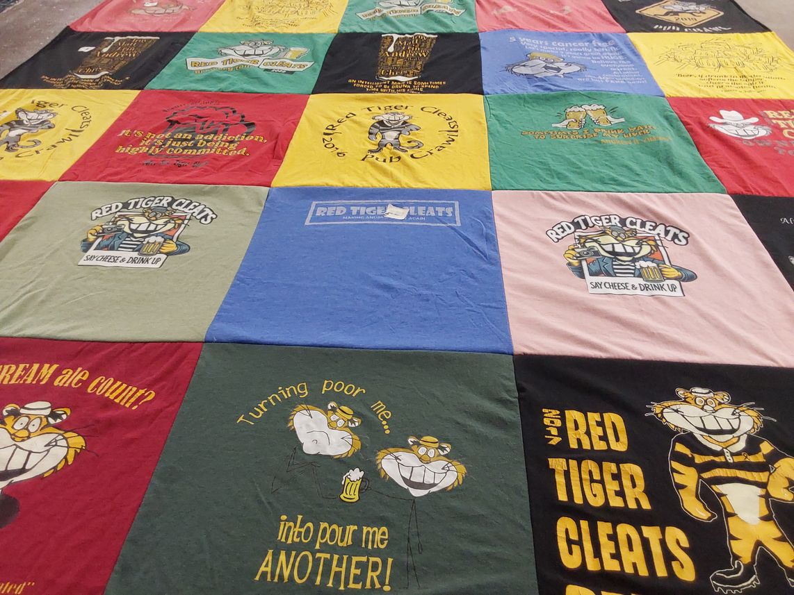 T-shirt quilt with beer, food themes by Amy from MN