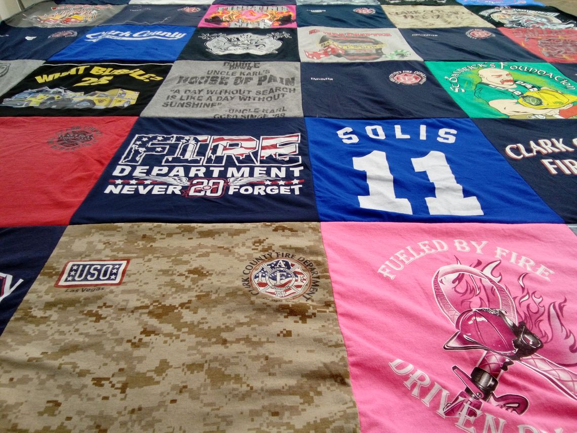 T-shirt quilt with firefighting, emergency services themes by Ronald from NV