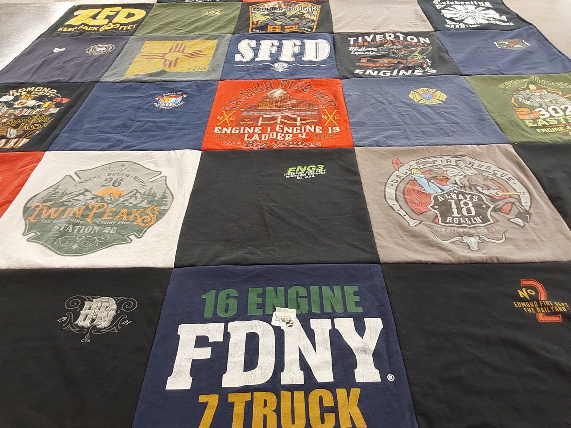 T-shirt quilt with firefighting, emergency services themes by Angela from NM