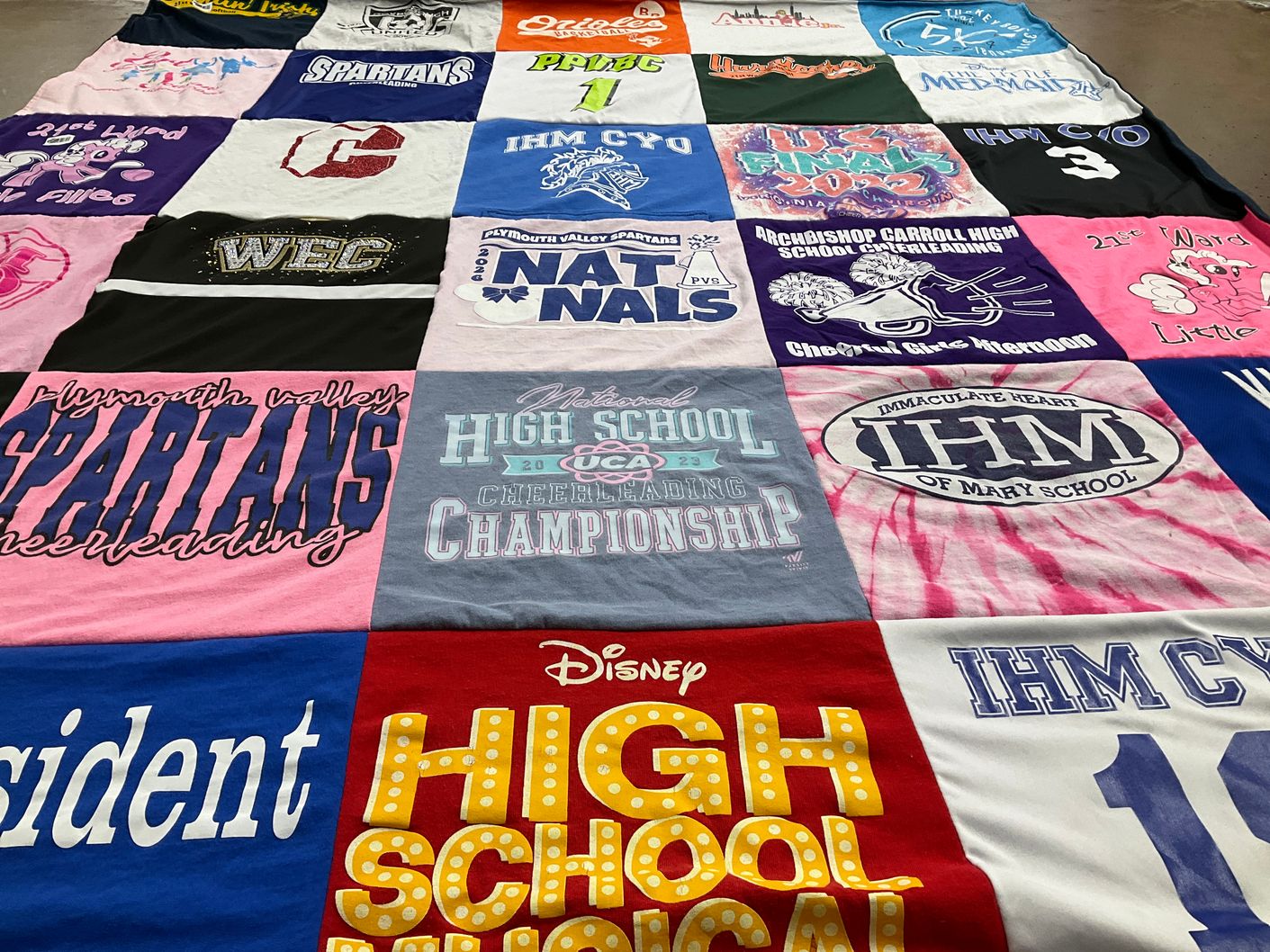 T-shirt quilt featuring plymouth valley spartans, archbishop carroll cheerleading by Nichole from PA
