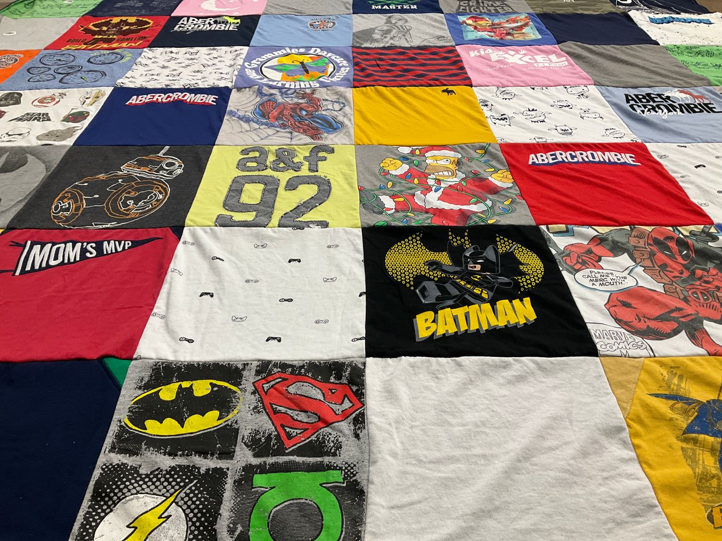 T-shirt quilt with comics, superheroes themes by Marcela from TX