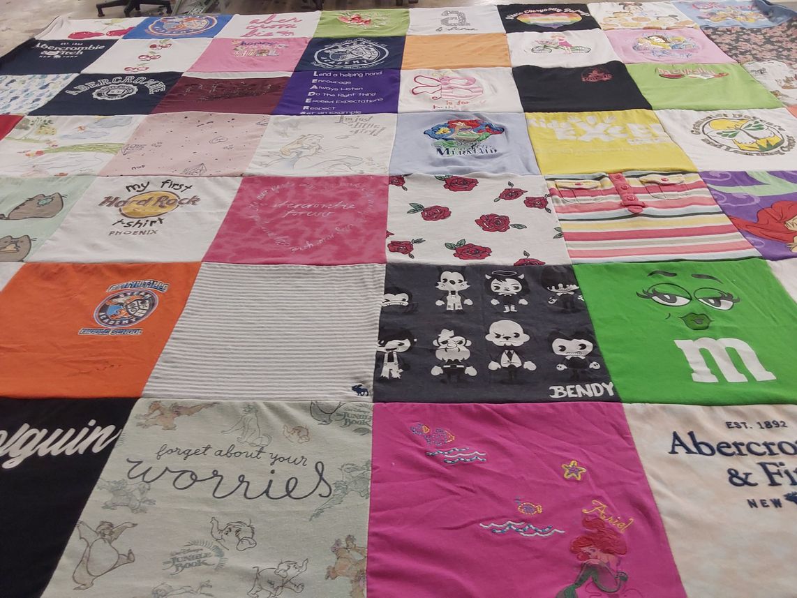 T-shirt quilt with music, cartoons themes by Marcela from TX