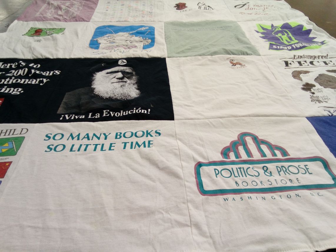T-shirt quilt with literature, evolution themes by Joel from NY