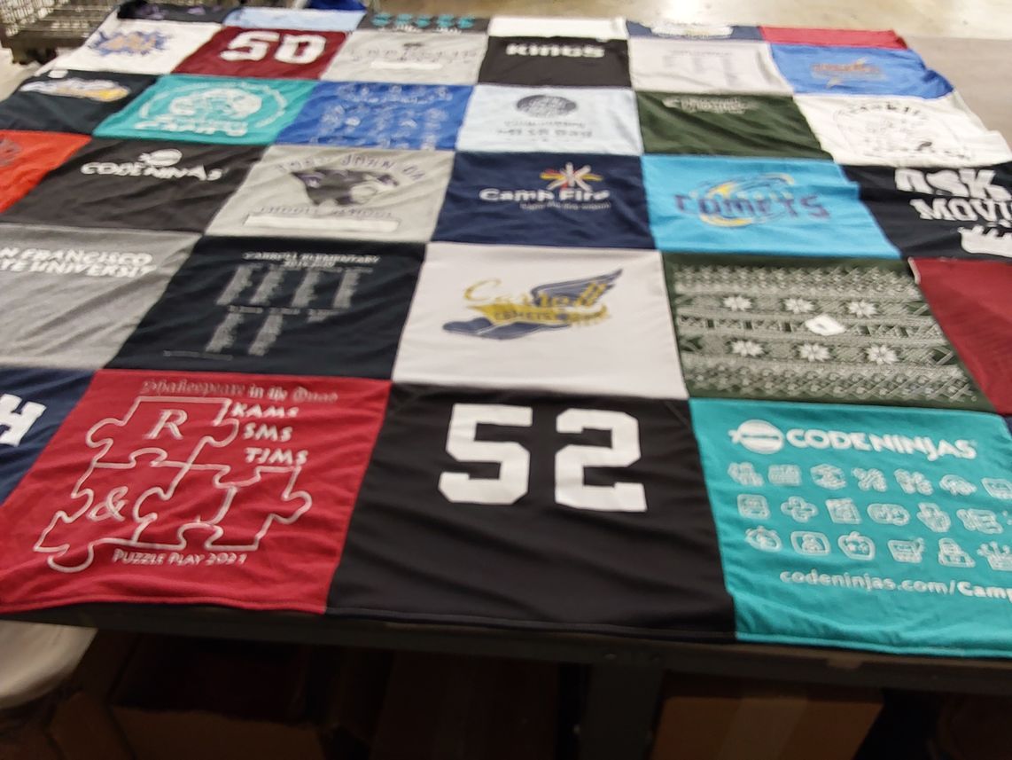 T-shirt quilt featuring comets by Lisa from CA