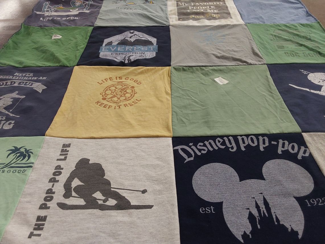 T-shirt quilt with outdoor activities, skiing themes by Susan from NJ