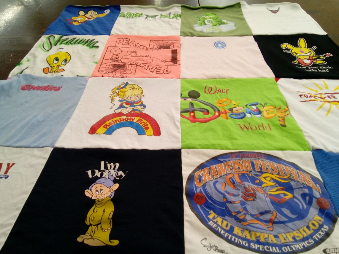 T-shirt quilt with disney, crawfish festival themes by Shawna from TX