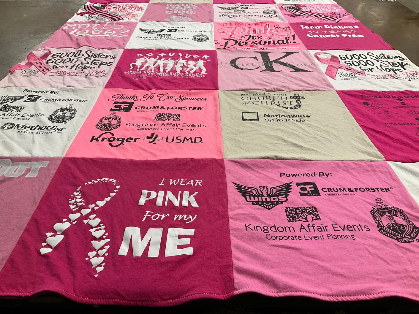 T-shirt quilt with breast cancer awareness, charity events themes by Denise from TX