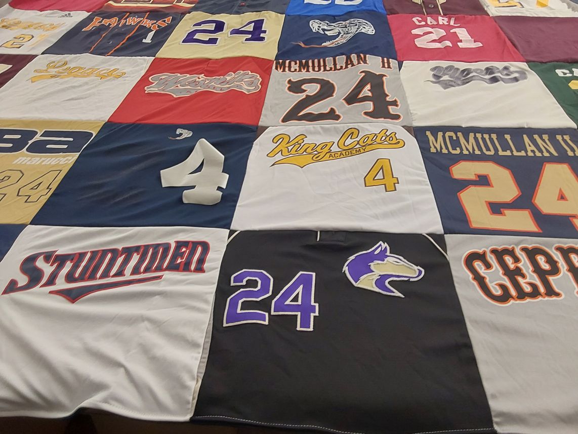 T-shirt quilt featuring mavericks by Amber from CA