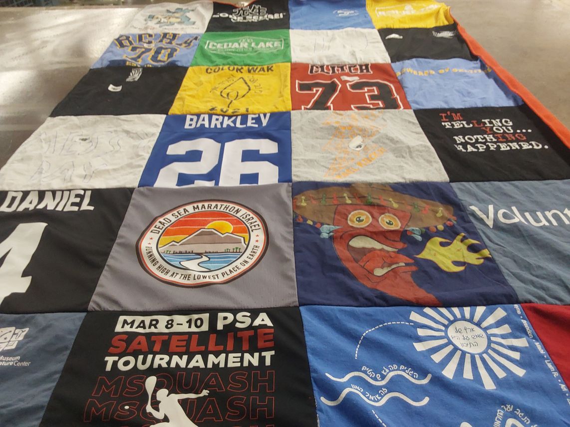 T-shirt quilt with sports, running themes by Julie from CT