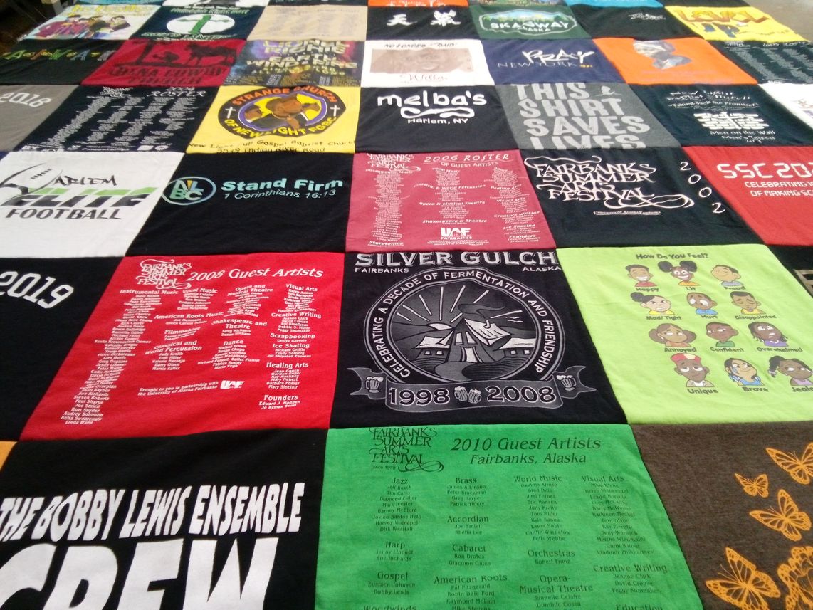 T-shirt quilt with music, art themes by Rudolph from NY
