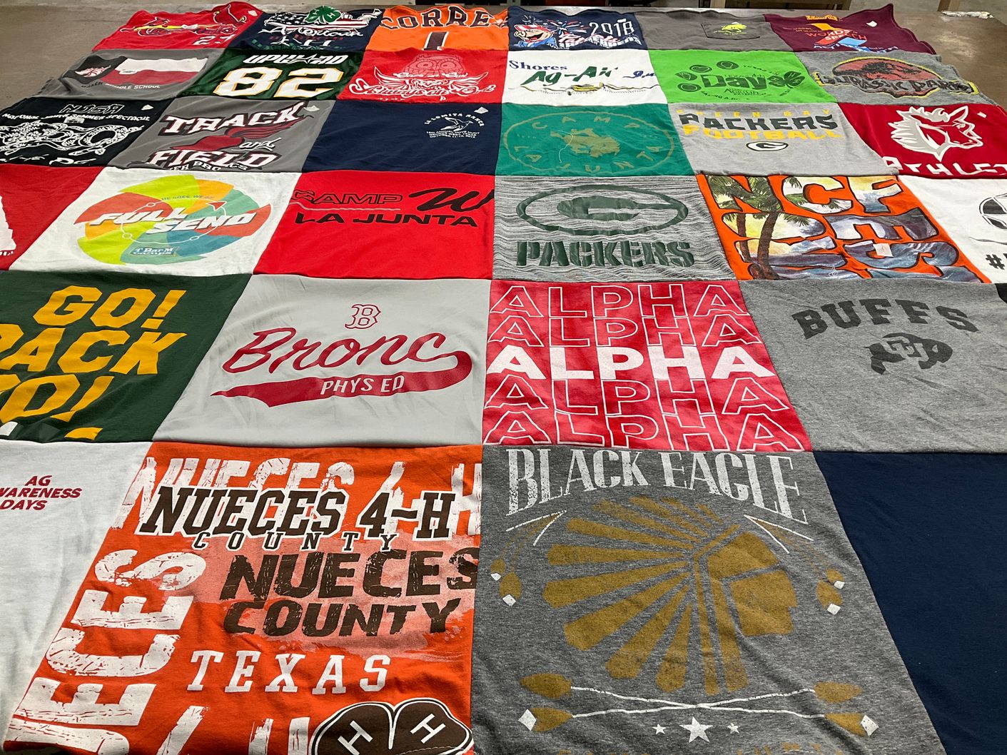 T-shirt quilt featuring green bay packers, university of colorado boulder buffaloes by Jennifer from TX