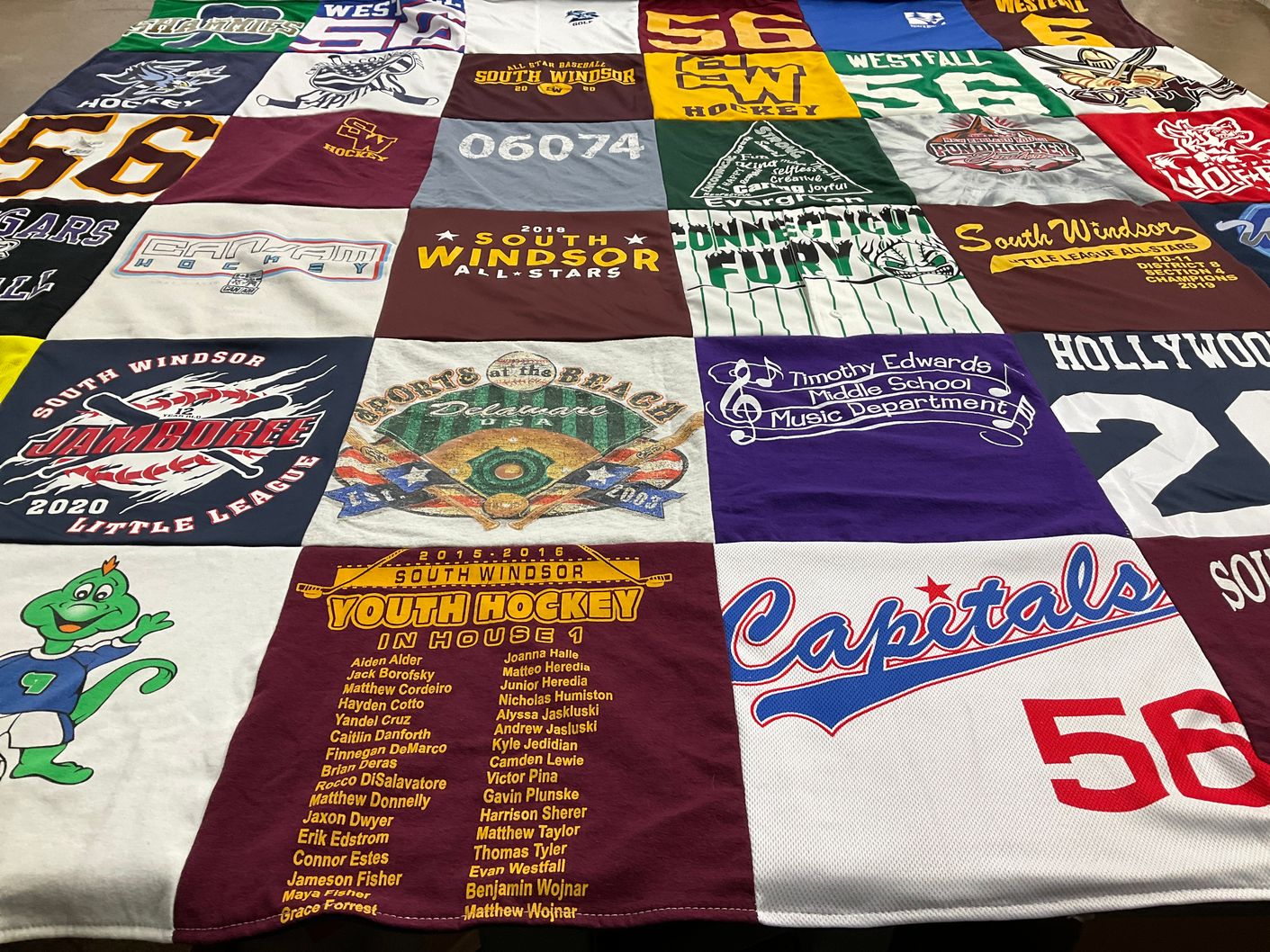 T-shirt quilt featuring south windsor youth hockey by Cara from CT