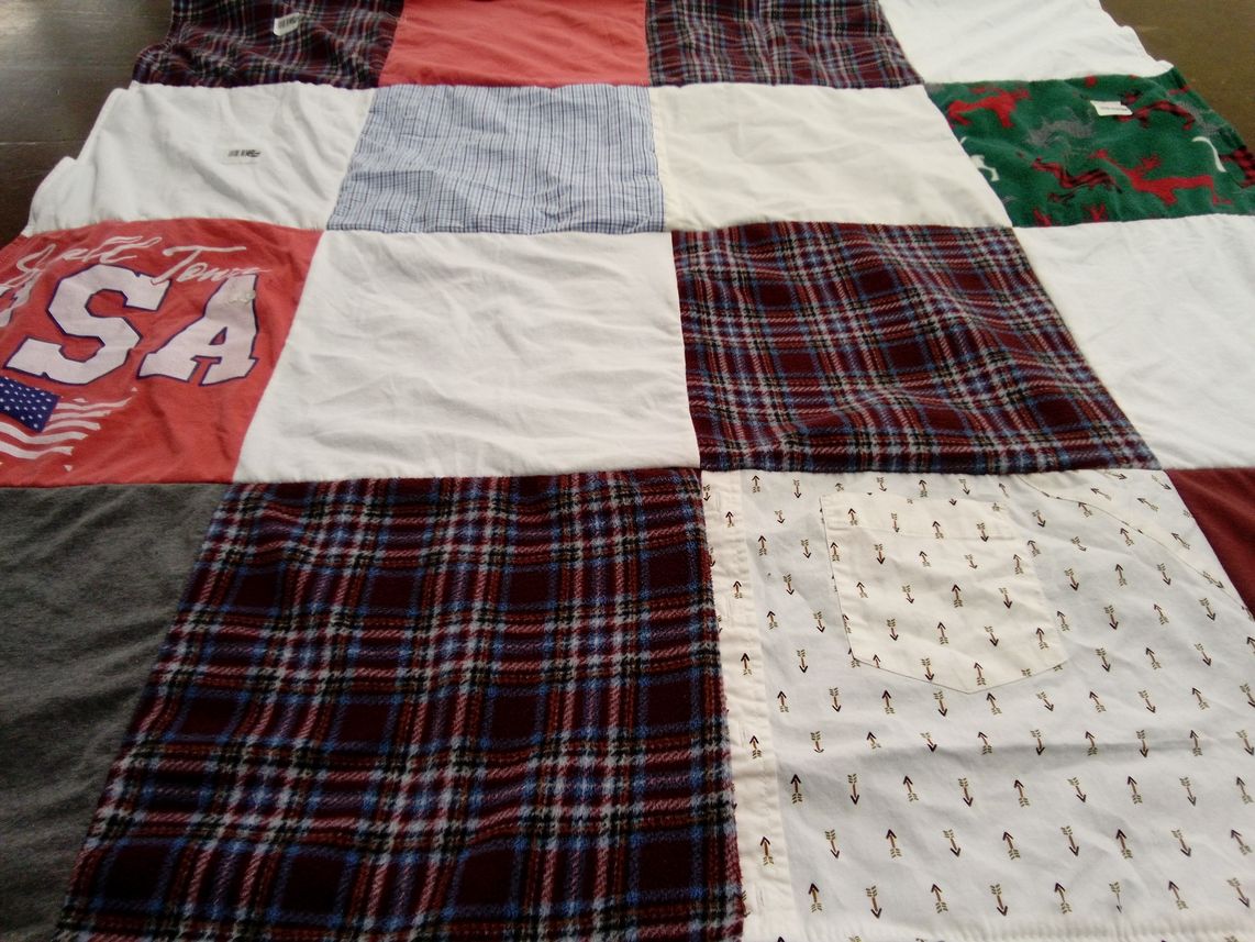 T-shirt quilt with sports themes by Jackie from CT
