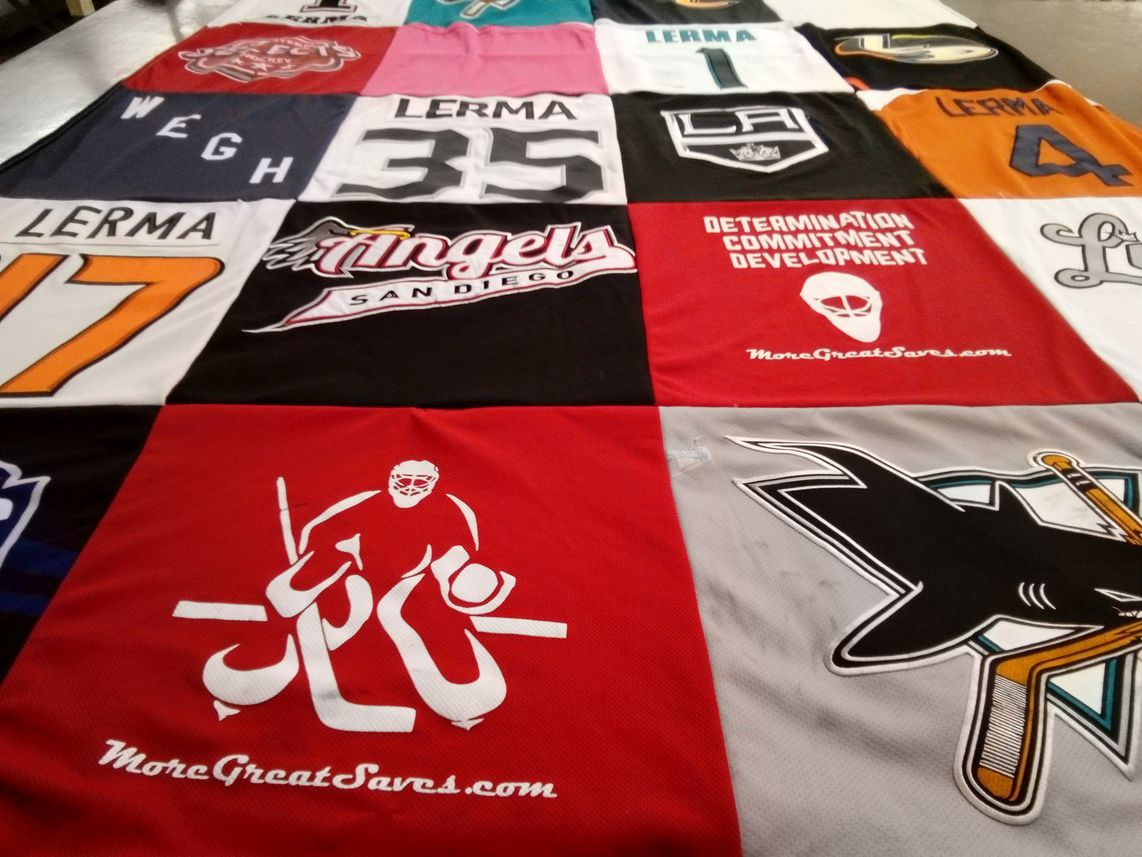 T-shirt quilt with hockey, sports themes by Stacey from CA