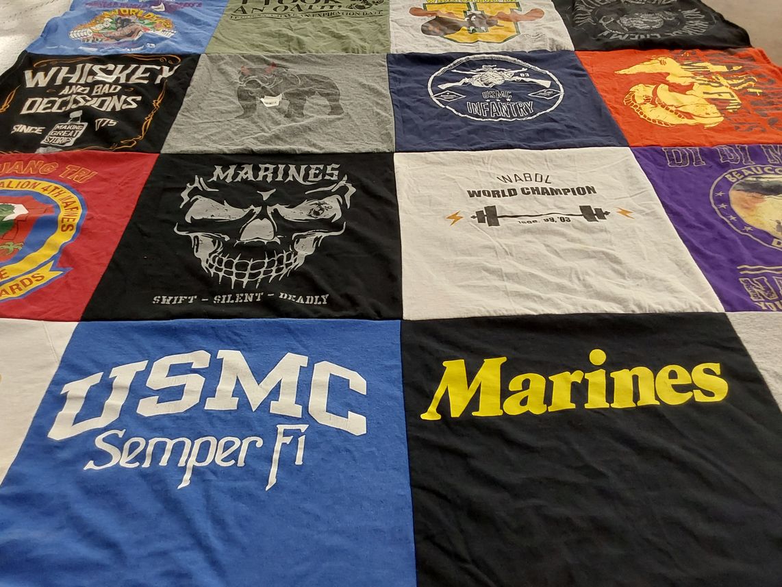 T-shirt quilt with military, fitness themes by Rachael from GA