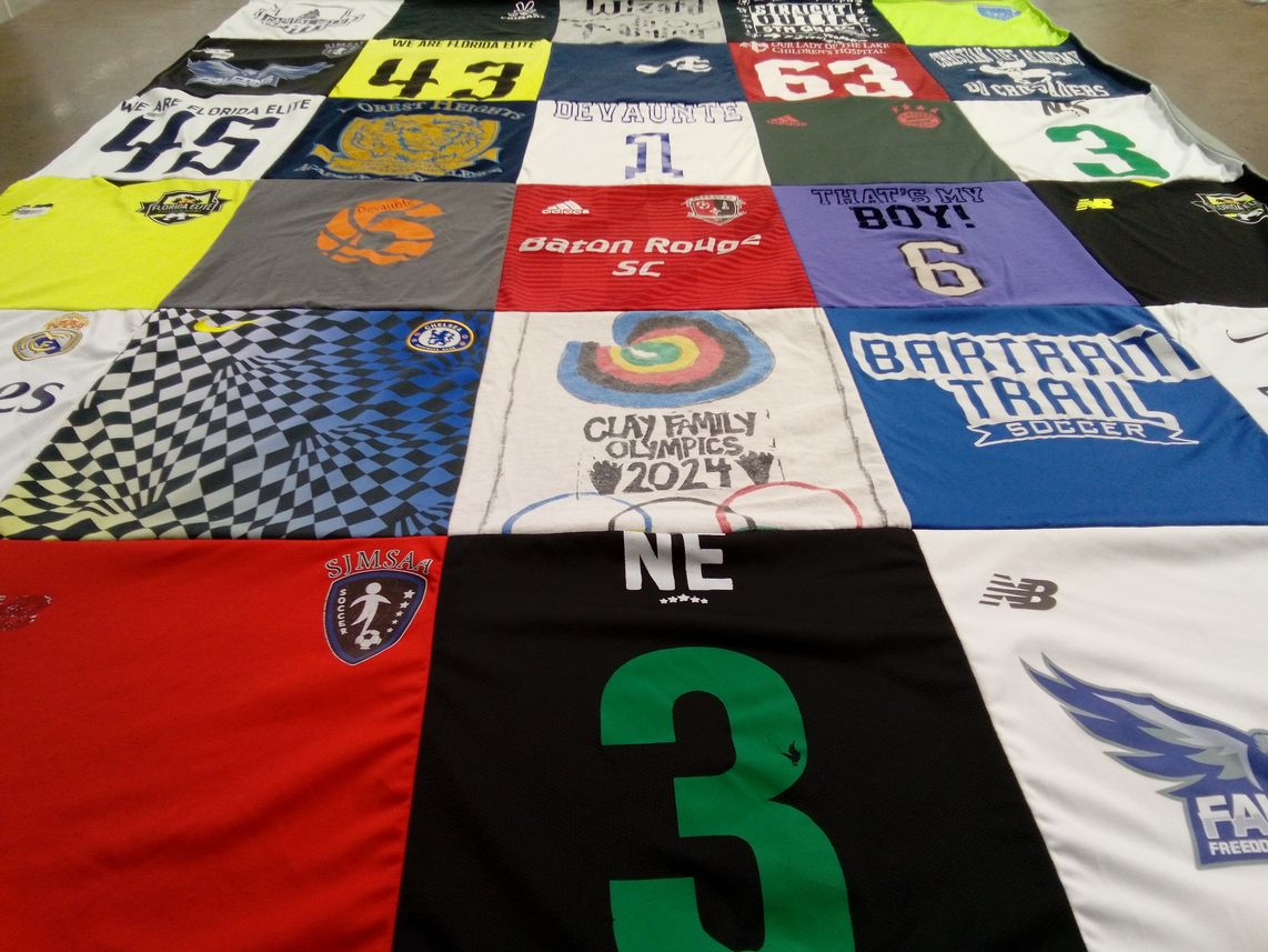T-shirt quilt with soccer, olympics themes by Leaner from FL