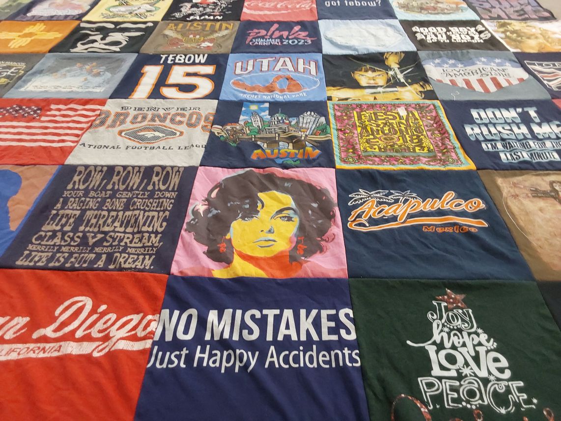T-shirt quilt with travel, sports themes by James from TX