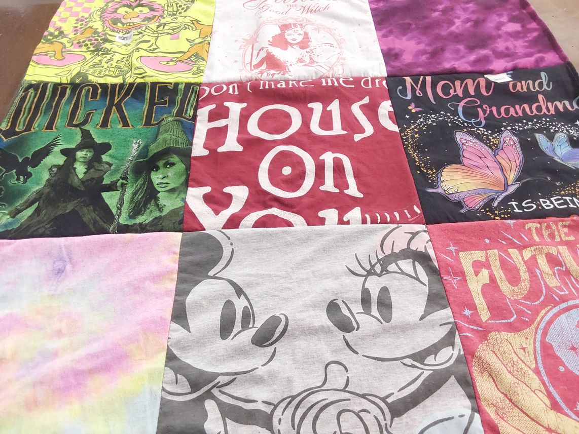 T-shirt quilt with theater, family themes by Tina from MD