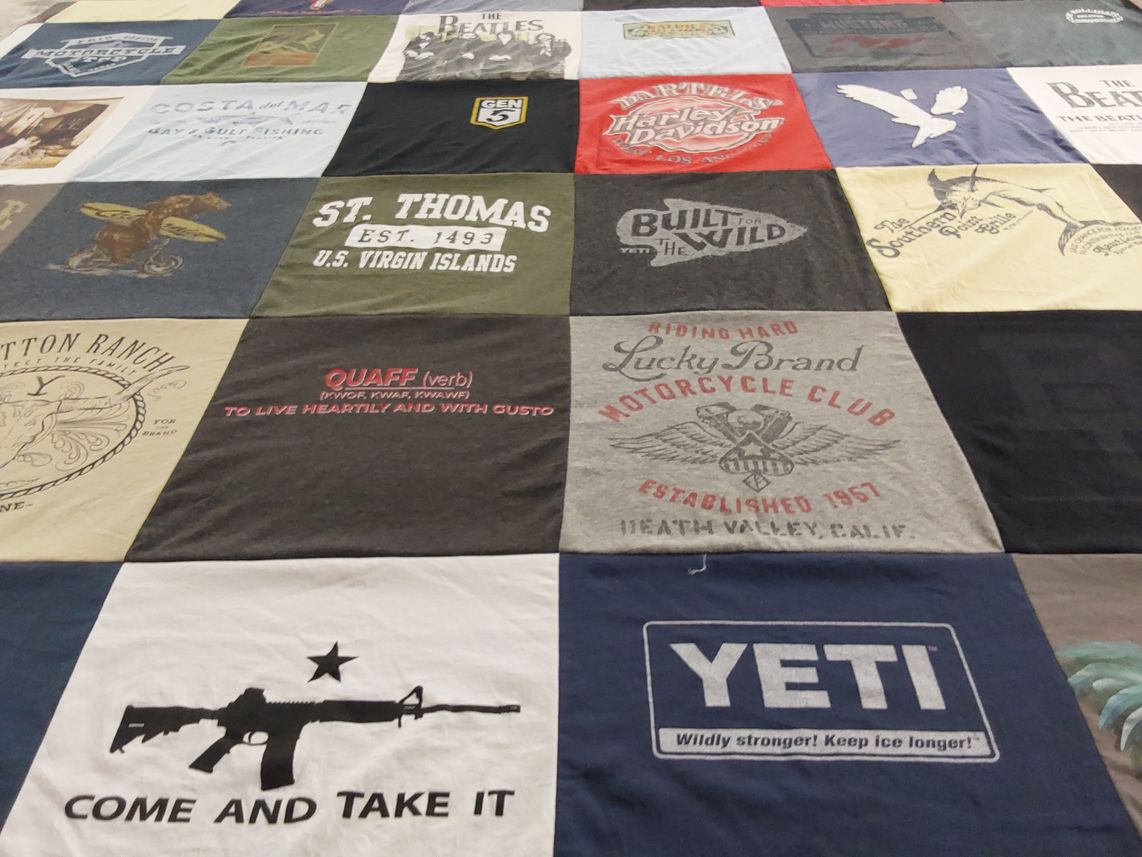 T-shirt quilt with fishing, motorcycles themes by Joy from IN