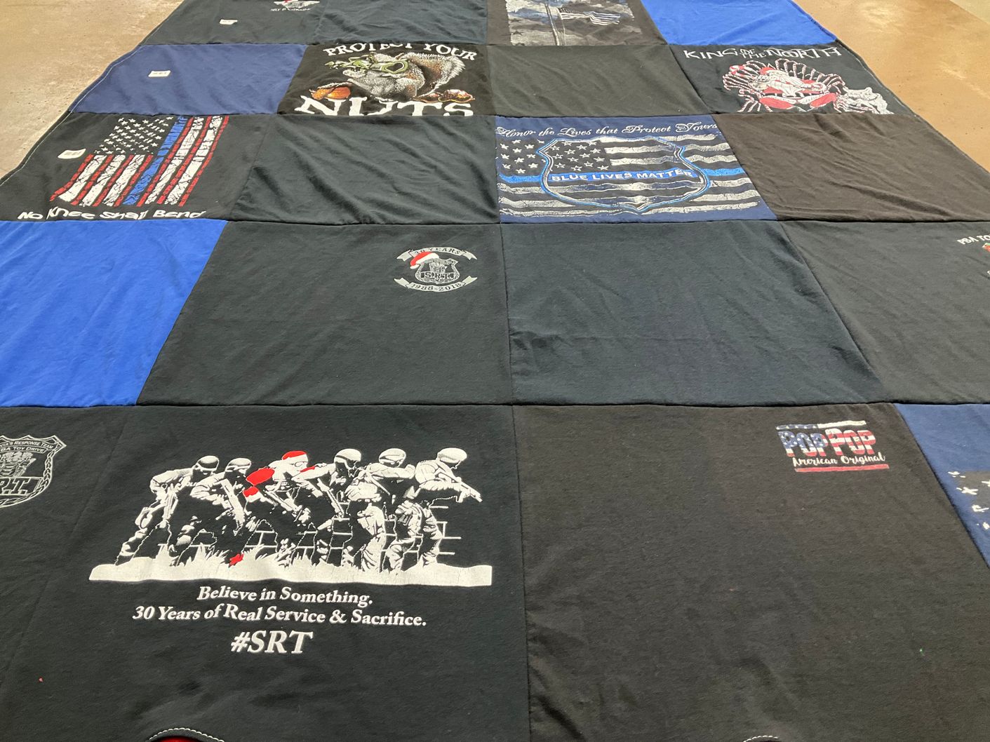 T-shirt quilt with military, law enforcement themes by Karen from NJ
