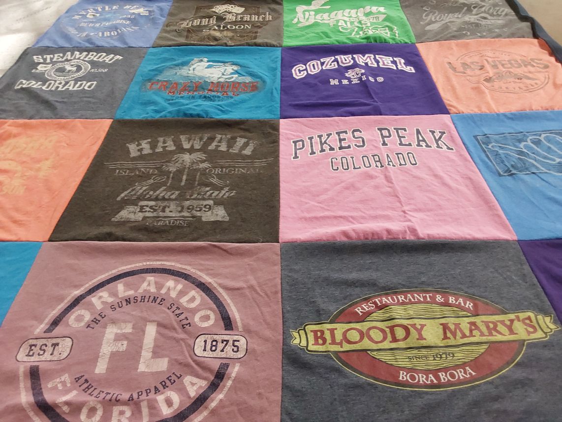 T-shirt quilt with travel, vacation themes by Peggy from OK