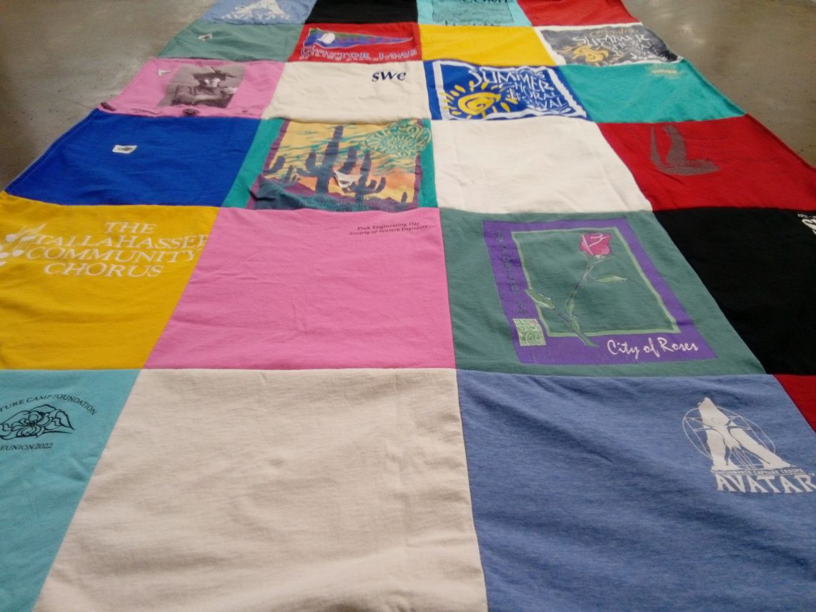 T-shirt quilt with choral music, engineering themes by Peggy from VA