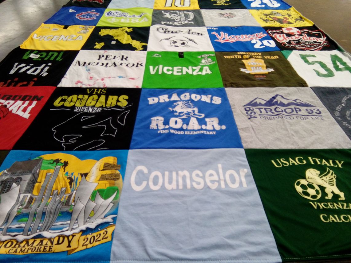 T-shirt quilt featuring vicenza high school cougars, pine wood elementary dragons by Rita from OH