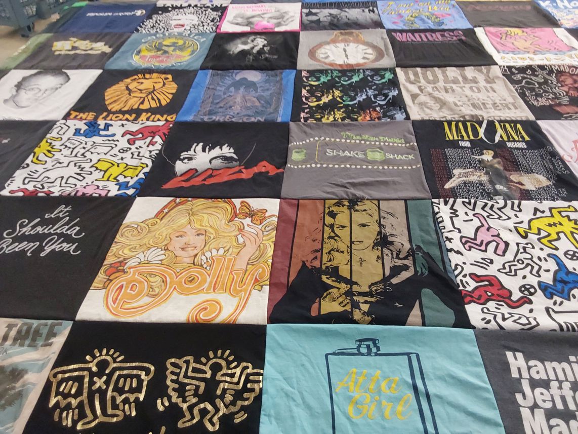 T-shirt quilt with musicals, pop culture themes by John from WI