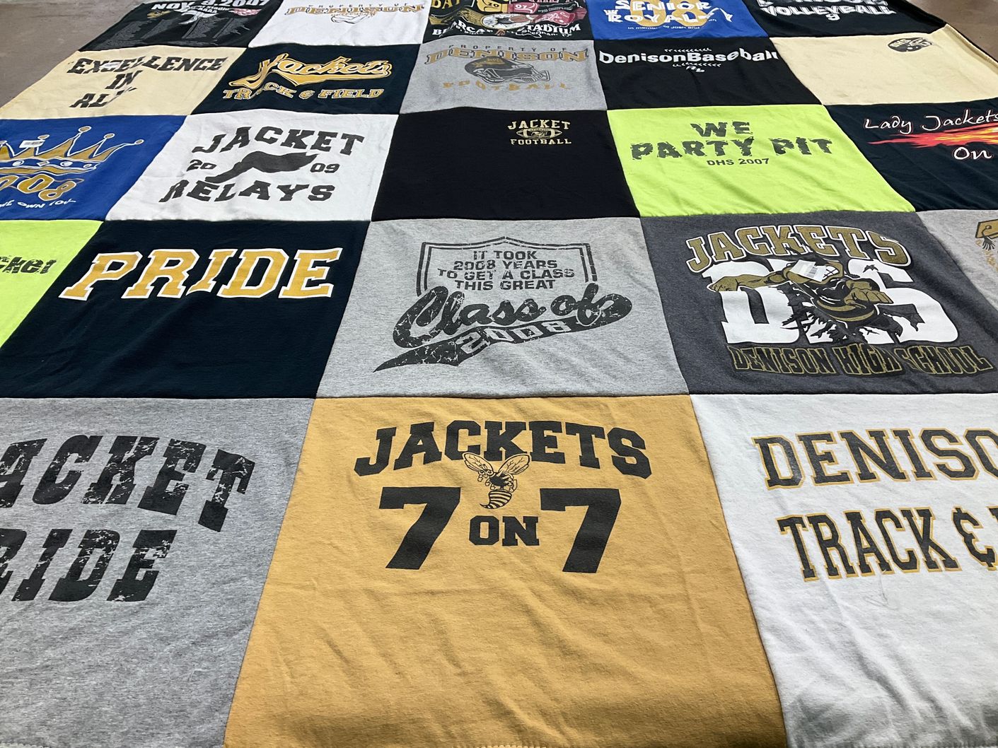 T-shirt quilt featuring denison high school jackets by Erin from TX