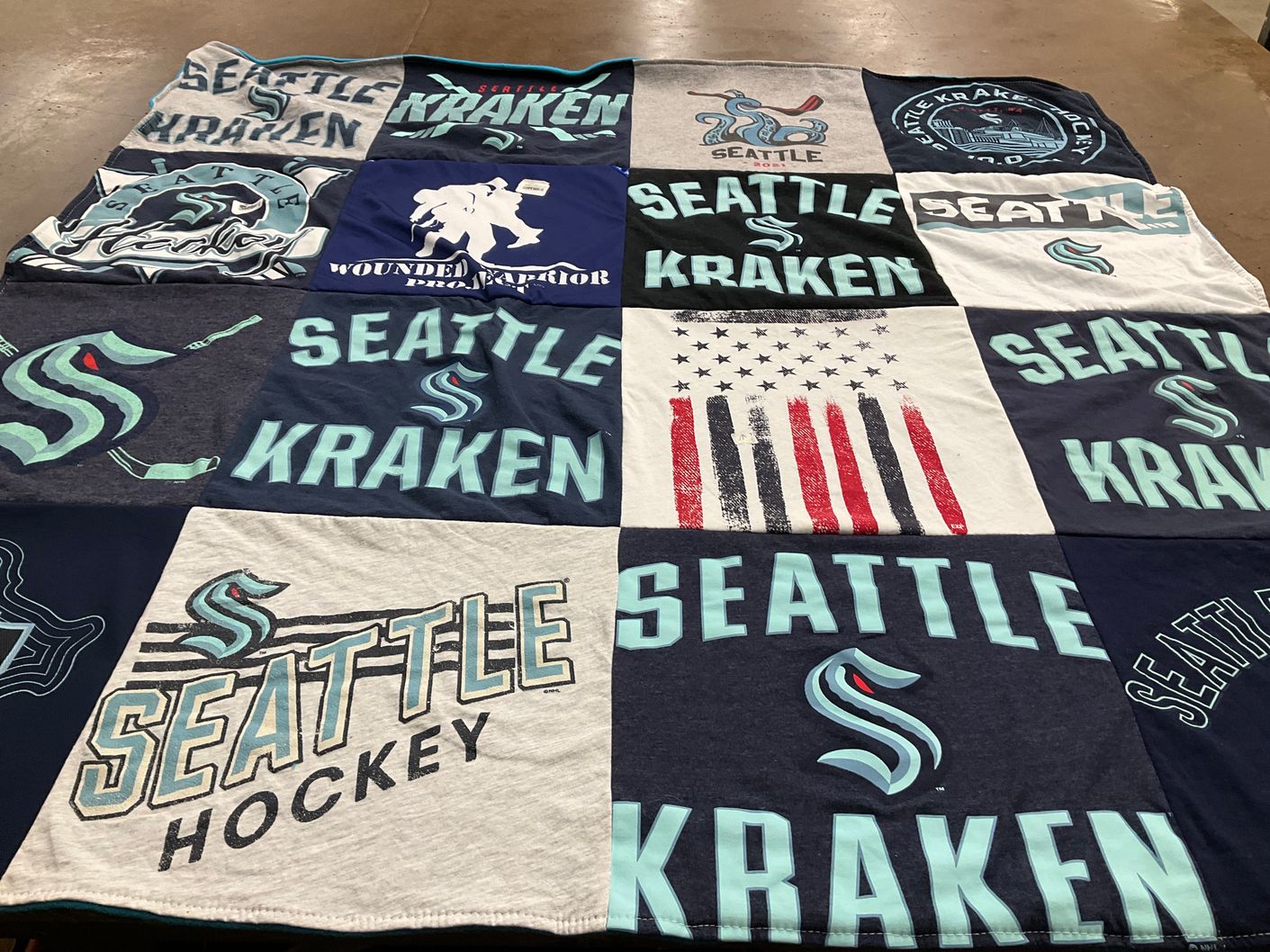 T-shirt quilt with hockey themes by Charles from WA