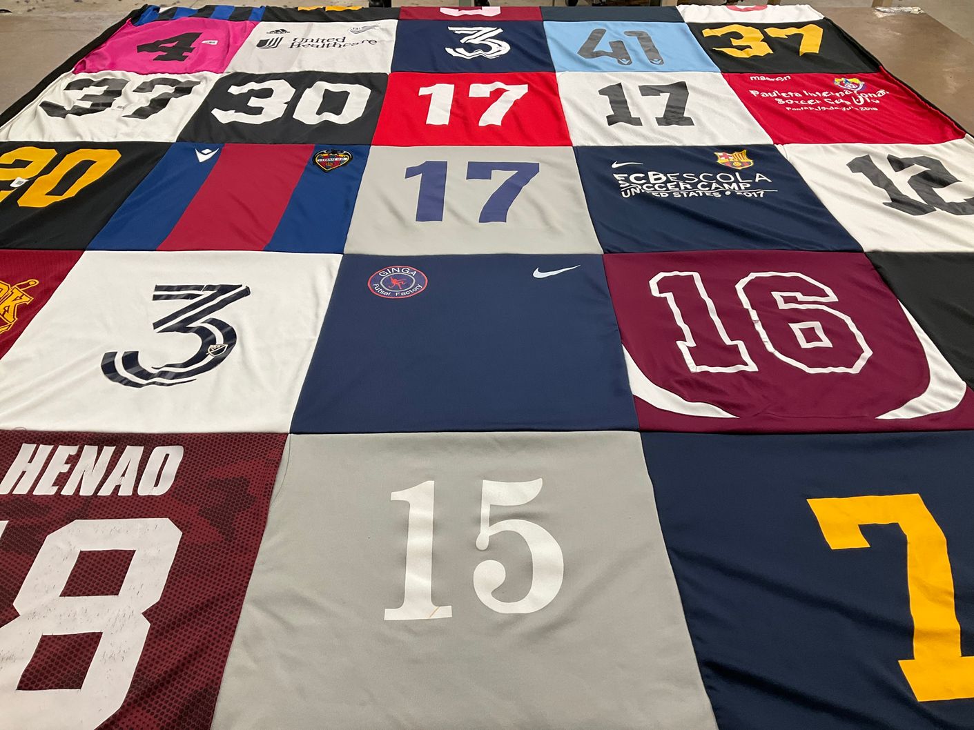 T-shirt quilt with soccer themes by OLGA from MA