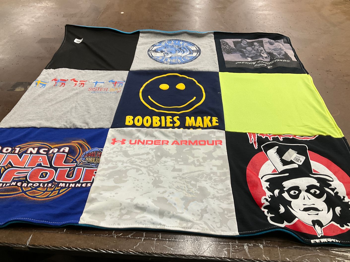 T-shirt quilt with sports, humor themes by Bobbie from MN