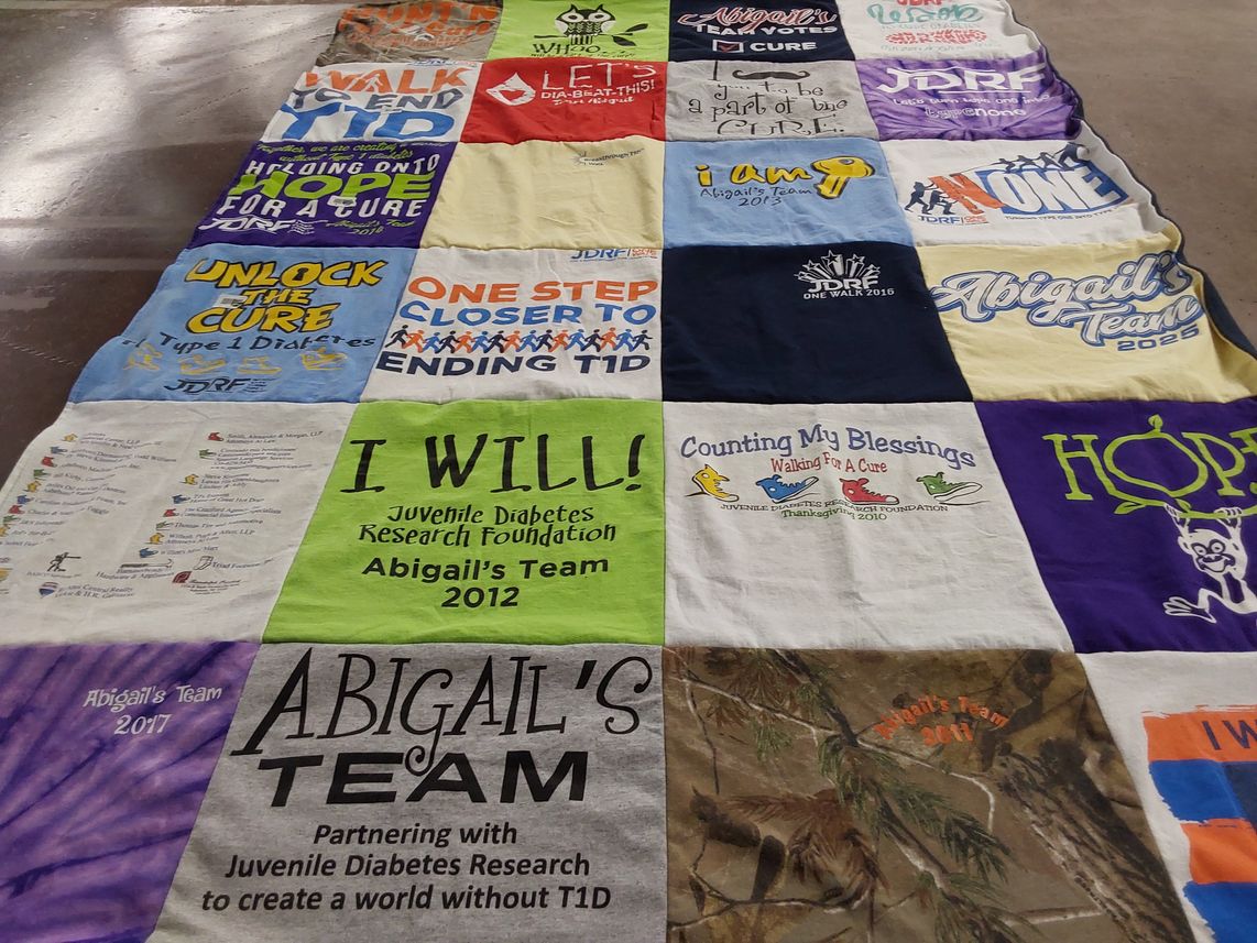 T-shirt quilt with diabetes research, fundraising themes by Christian from NC