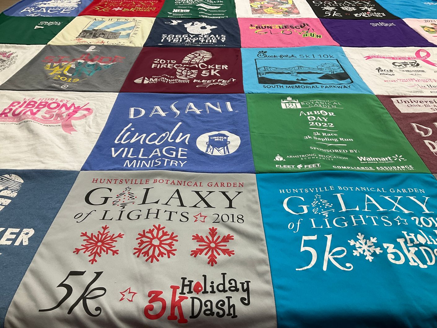 T-shirt quilt with running, community events themes by Brenda from AL