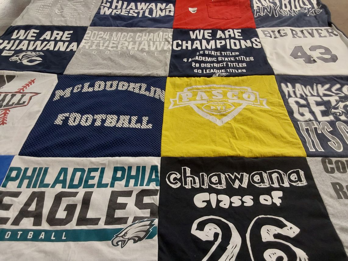 T-shirt quilt featuring chiwana wrestling, mcloughlin football by Elizabeth from WA