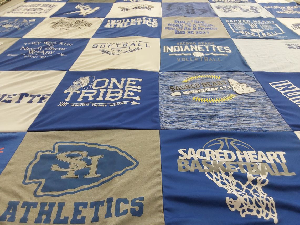 T-shirt quilt featuring sacred heart indians, sacred heart indianettes by Myra from TX