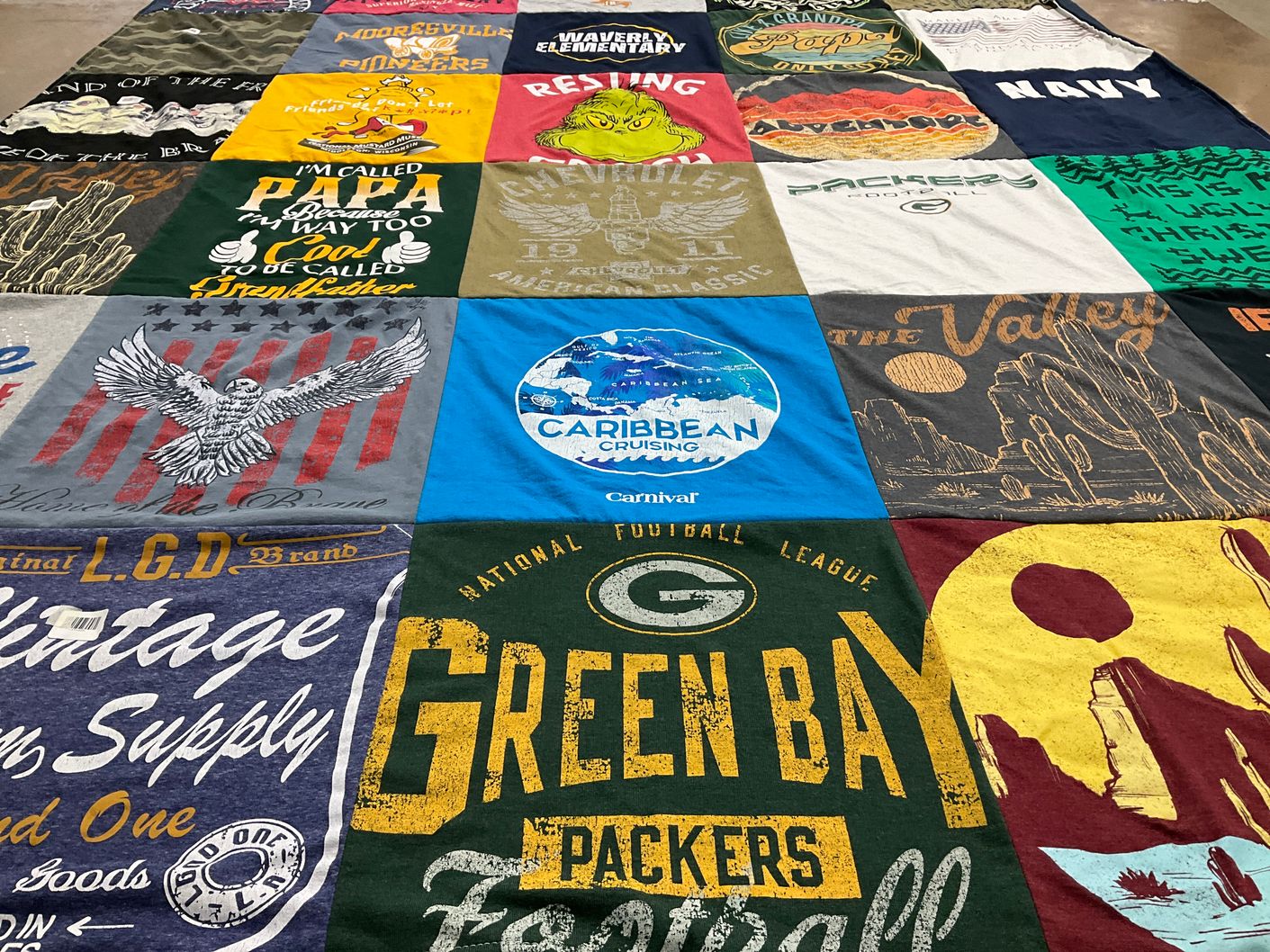 T-shirt quilt featuring green bay packers football by Sandra from IN