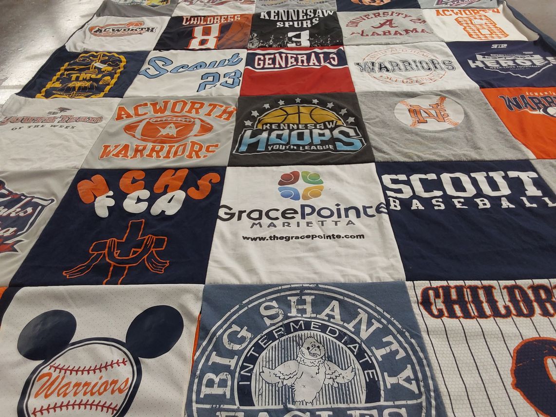 T-shirt quilt featuring acworth warriors, kennesaw spurs by Michele from GA
