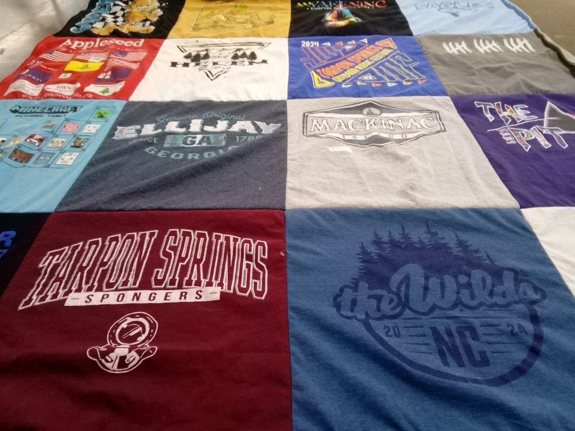 T-shirt quilt featuring tarpon springs spongers by Darcy from FL