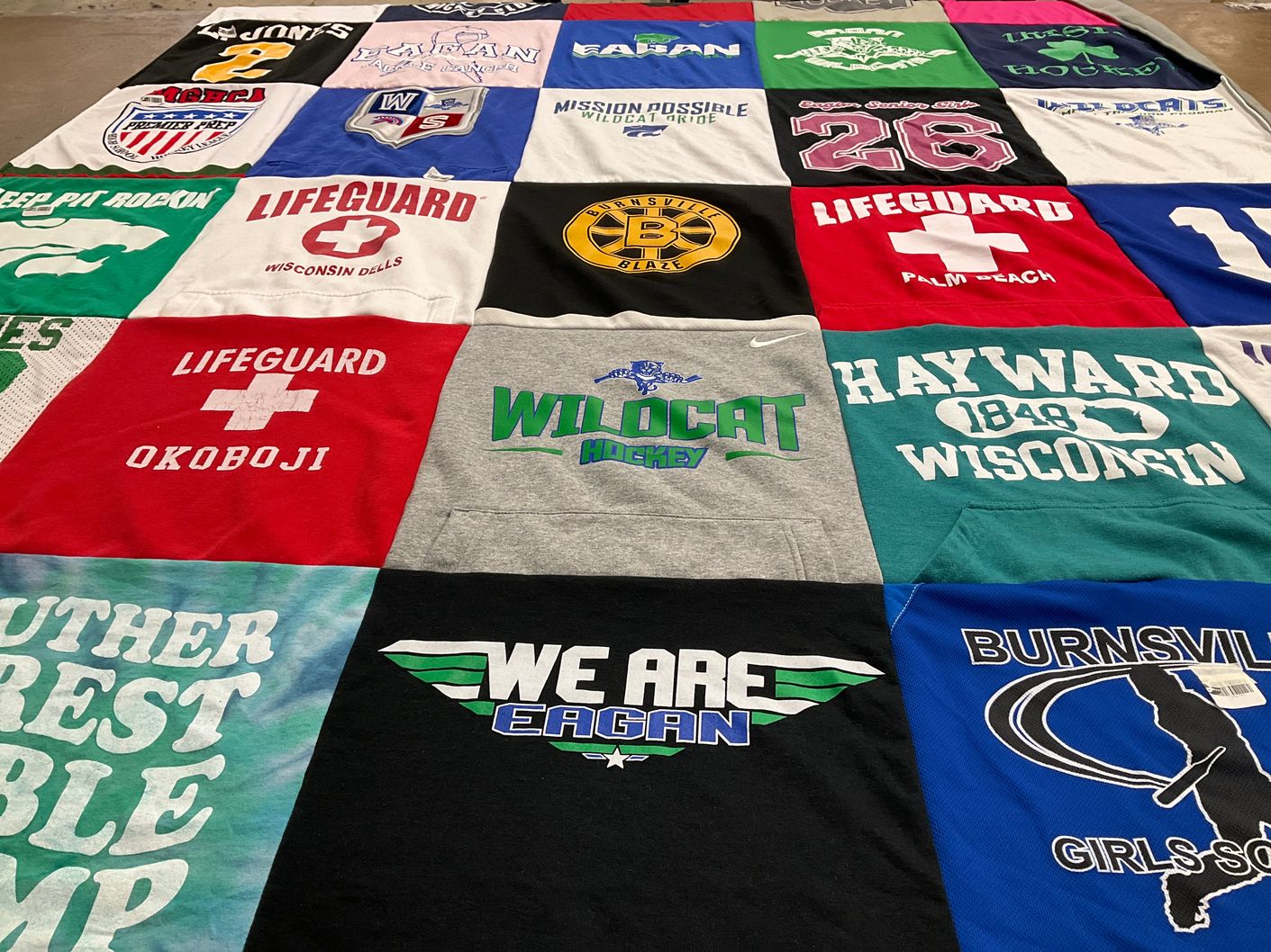 T-shirt quilt featuring wildcat hockey, eagan by Carrie from MN