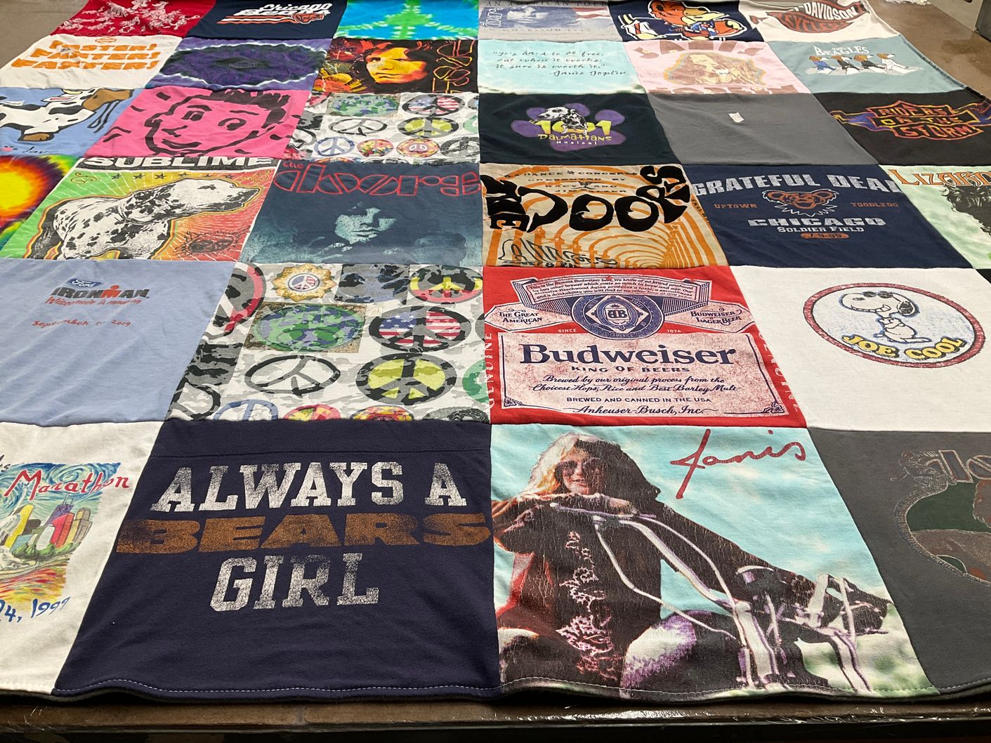 T-shirt quilt with music, running themes by Kathleen from MI