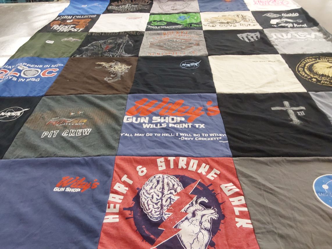 T-shirt quilt with firearms, health awareness themes by Leyla from TX