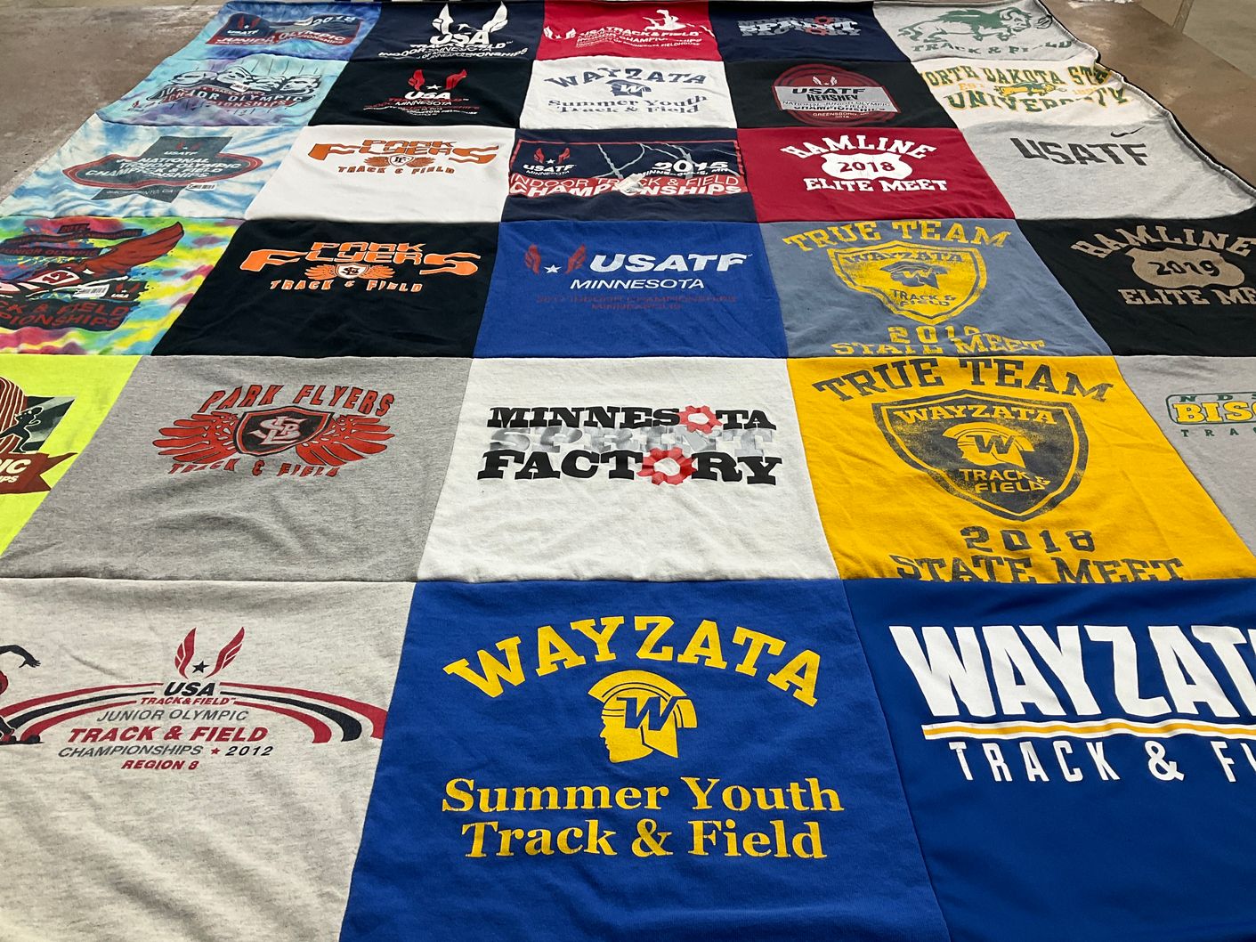 T-shirt quilt featuring wayzata track and field, park flyers track and field by Mara from MN