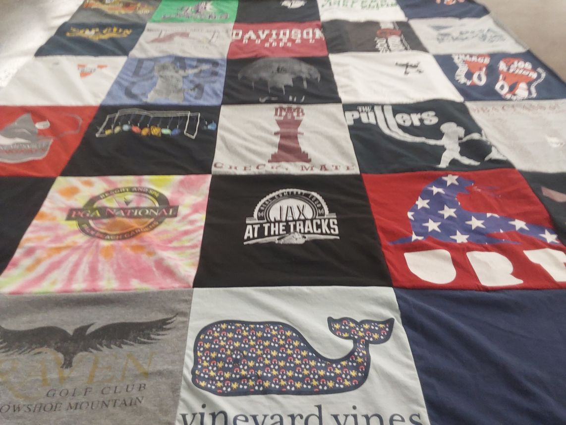 T-shirt quilt with golf, outdoor activities themes by Darcy from TN