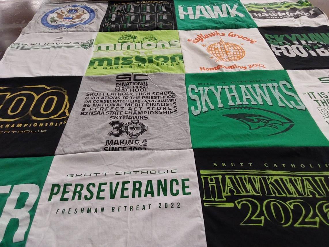 T-shirt quilt featuring skutt catholic high school skyhawks by Trisha from NE