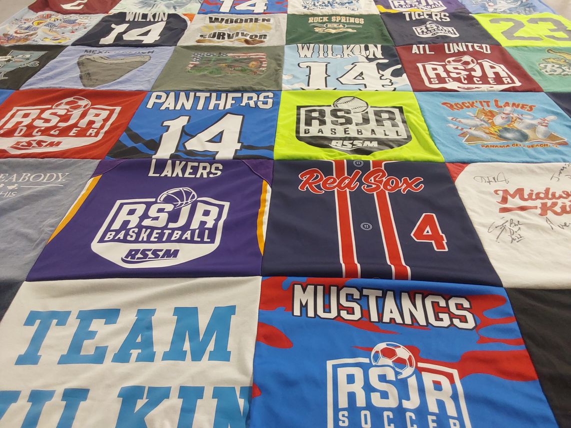 T-shirt quilt featuring lakers, panthers by Vicki from GA